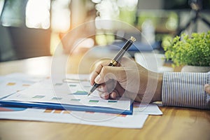 Excel stat spreadsheet business analytics graph statistic with graph and table data number in charts database. Accountant hands