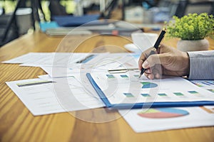 Excel stat spreadsheet business analytics graph statistic with graph and table data number in charts database. Accountant hands