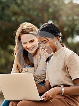 Excellence is a continuous process, not an accident. two attractive young female students using a laptop while sitting