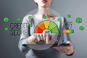 Excellent credit score with woman using a tablet