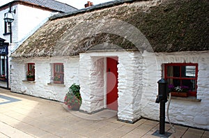An excellent example of a preserved Irish Cottage with superb thatched roof in Londonderry Ireland