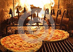 Excellent fragrant pizza baked in a wood fireplace 1