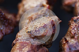 Excellent fresh juicy pieces of meat shish kebab fry on charcoal grill.