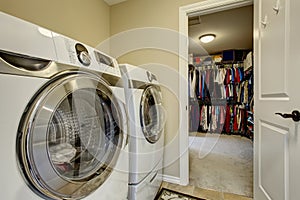 Excellent laundry room with washer and dryer. photo