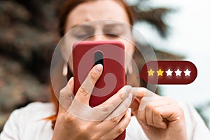 Excellent. Person using mobile phone with icon two star symbol to increase rating of company, customer service concept