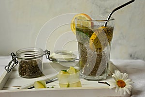 Chia water and lemon are an excellent source of omega-3 fatty acids, rich in antioxidants, and they provide fiber, iron, and calci photo