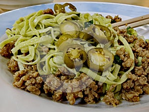 Excellent and tasty spinach noodles with minced pork and green chillies, Chinatown, Kuala Lumpur.