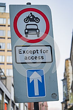 Except for access road sign