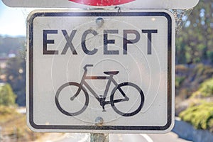 Except bicycle signage outdoors in San Francisco, California photo