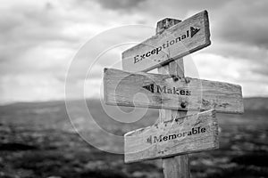 exceptional makes memorable text quote on wooden signpost outdoors