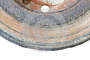 Excessively used rusty brake disc close-up photo