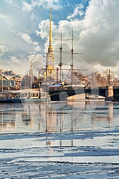 Exchange Bridge and The Peter and Paul Fortress near winter Neva