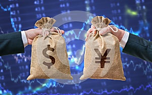 Exchange currency concept. Hands hold bag full of money - Dollar and Yen