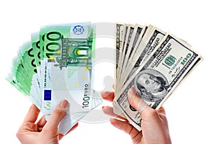 Exchange dollars to euro money in female hand.