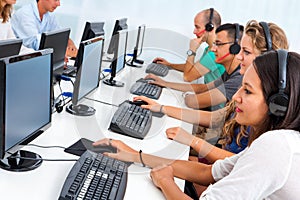 Exchange students working on computers.