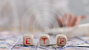 exchange-traded fund (ETF) is a type of pooled investment security that operates much like a mutual fund.