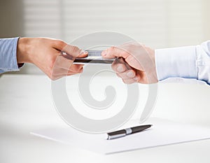 Exchanging credit card over the table