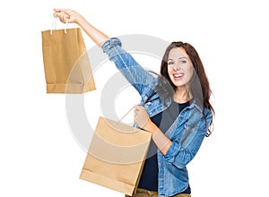 Excite woman hold shopping bag