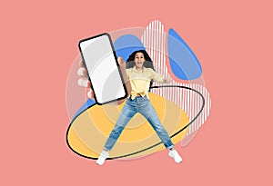 Excited Arab Female Pointing At Big Blank Smartphone In Her Hand