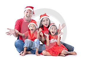 Excited asian family with christmas head