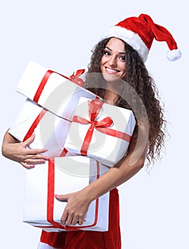 Excited attractive woman with many gift boxes and bags.