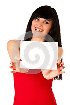 Excited beautiful young woman showing a blank paper isolated