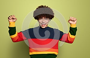 Excited black boy celebrating victory