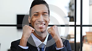 Excited Black Businessman Celebrating Success, Achievement
