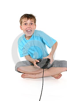 Excited boy playing a computer game