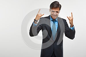 Excited business man celebrating success isolated on white background