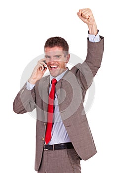 Excited business man on the phone