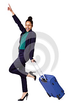 Excited business woman with travel bag