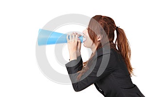 Excited business woman yelling through megaphone