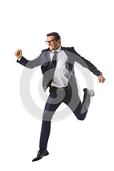 excited businessman in eyeglasses jumping and gesturing by hands
