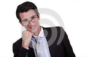 Excited businessman in glasses