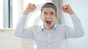 Excited Businessman going Crazy Because of Success, Achievement photo
