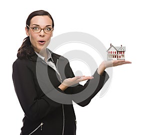 Excited Businesswoman Holding Small House to the Side