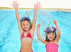 Excited, cheers and portrait of kids at swimming pool, ready for adventure on vacation. Holiday, resort and friends