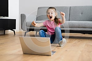 Excited Child Browsing Internet