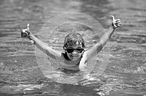 Excited child relax in summer swimming pool. Children play in tropical resort. Family beach vacation.