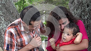 Excited Couple With Baby Boy