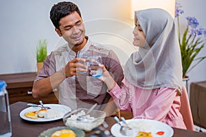 excited couple having iftar dinner time together