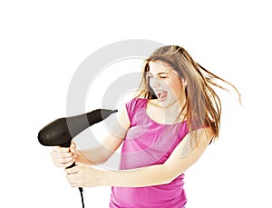 Excited female drying her hairs with drier