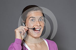 excited female phone operator welcoming phonecall