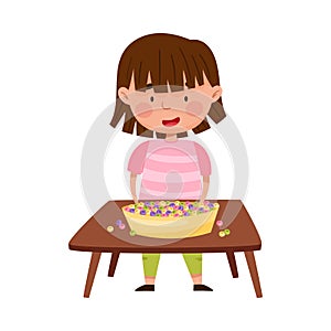 Excited Girl at Desk Playing with Colorful Beads Vector Illustration