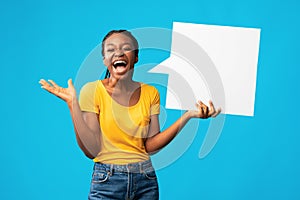 Excited Girl Holding Speech Bubble Shouting Standing On Blue Background