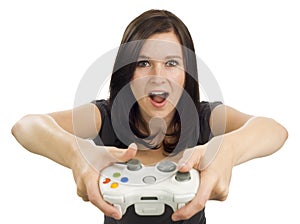 Excited girl holding video game controller