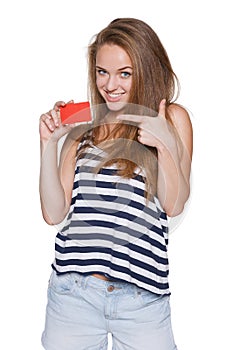 Excited girl teenager hipster with credit card