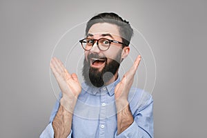 Excited hipster in surprise