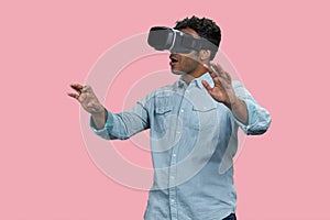 Excited indian man expreiences virtual reality.